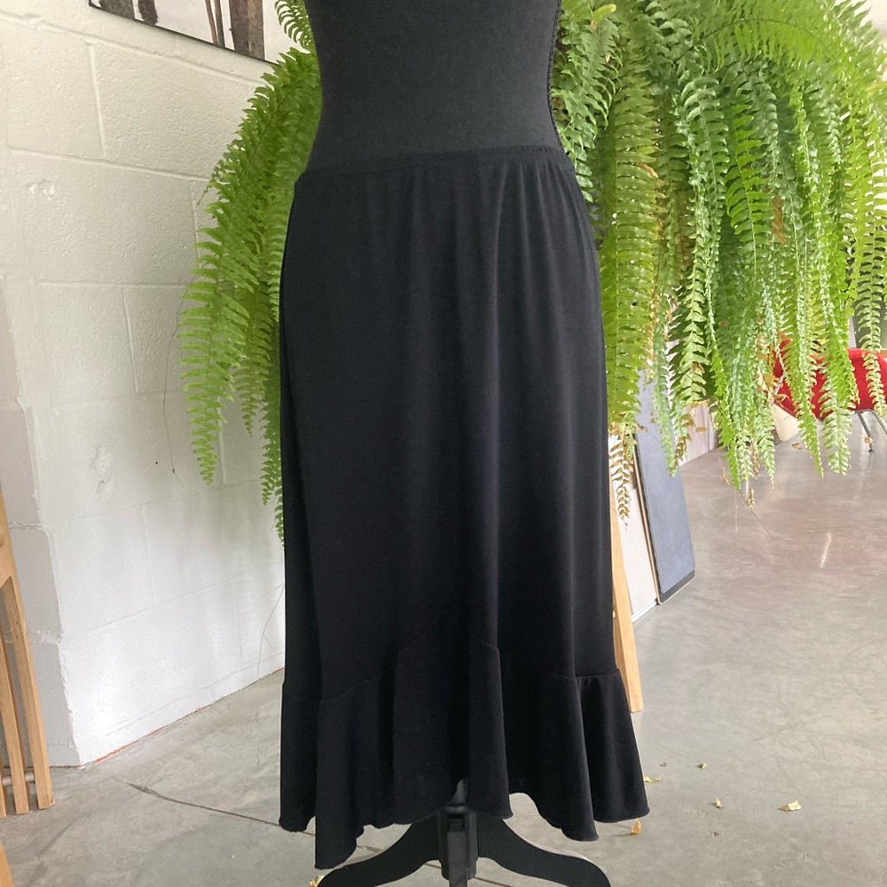 Like new Syko black skirt w/ruffle hem